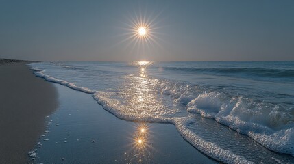 Wall Mural - Sunrise over tranquil ocean beach.