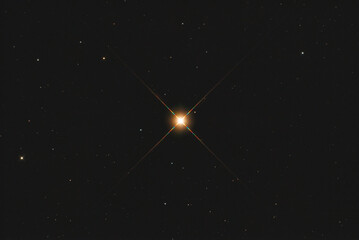 Wall Mural - the aldebaran (alpha tauri) star in taurus constellation, taken with amateur telescope.