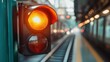 ©  Jovaduplex - A railway signal radiating an orange light amidst an urban scene captures the essence of transportation safety, highlighting the importance of adherence to signals in city life.