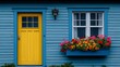 © Rahmawati - Vibrant yellow door and window box with colorful flowers on a blue house.