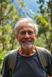 © Derek Brumby - Smiling Elderly Man Hiking in a Lush Green Forest Landscape