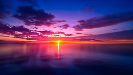 Wall Mural - serene sunset over calm water landscape of vibrant colors and reflections in sky, creating peaceful 