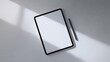 © Unitees Studio - Mockup of White Blank Screen Tablet with Black Stylus on Minimalistic Light Gray Background