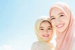 © Ryzhkov - Joyful Mother and Daughter with Hijabs Smiling Under Bright Sunlight