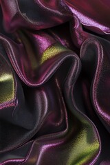 Leinwandbilder - Abstract close-up of iridescent purple and green fabric with flowing folds and shimmering texture.