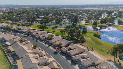 Wall Mural - Aerial view of suburban neighborhood with golf course.