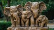 © NeuralNiche - Carved wooden elephant family sculpture in natural setting showcasing artistry and craftsmanship in wildlife artistry and home decor.