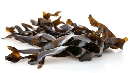 fresh dark brown seaweed arranged artistically on a clean white background showcasing its unique tex