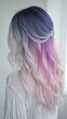 © pook - A display of pastel ombre shades blending from lavender roots to light pink and silver ends for a dreamy look.