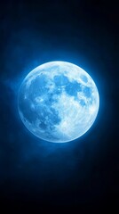 Wall Mural - a blue full moon in the night sky with a black background