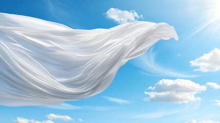 Wall Mural - a white cloth flying in the sky with clouds in the background