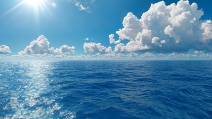 Poster - A large body of water under a blue sky with white clouds