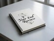 © scarlett - closeup notebook for Year End Review on white wooden desk,time and business concept