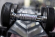 © Medical Works - Dumbbell exercises in the gym health and fitness concept. Stand with metal dumbbells. Sports and fitness room. Weight Training Equipment. healthy lifestyle, weight loss, training, bodybuilding,