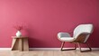© Nirwasita - chair and wood side table against empty Raspberry color wall background