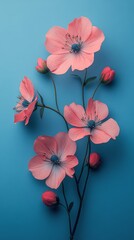 Wall Mural - Colorful arrangement of pink and blue flowers on a vibrant blue background