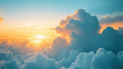 Wall Mural - aerial sunset view above clouds, golden light, dramatic sky.