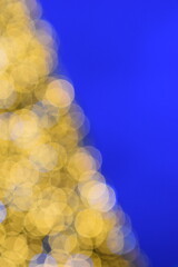 Wall Mural - a dreamy view of a golden christmas tree.