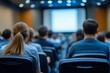 © Imagentive - Blurred Back View of Audience at Indoor Training Session
