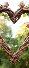 Wall Mural - Wicker heart with pink roses.