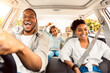 © Prostock-studio - Summer Road Trip. Happy Black Family Of Three Riding Car And Singing Having Fun Traveling By Automobile. Parents And Daughter Enjoying Auto Ride Together On Weekend. Panorama, Selective Focus