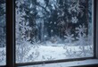 © Prayad - Frosty windowpane with snowflakes gently falling,  cold,  wintry, winter