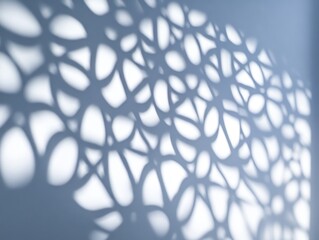 Aufkleber - Abstract light and shadow pattern on a wall, creating an organic, textured design.