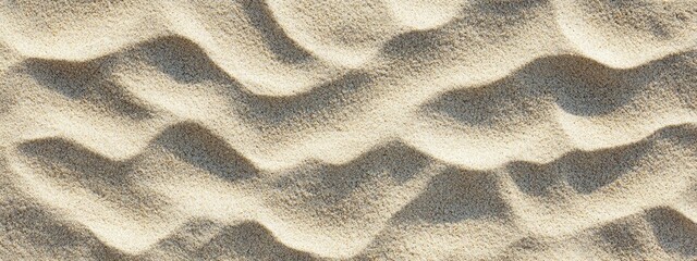 Poster - Close-up of wavy sand texture on a beach.