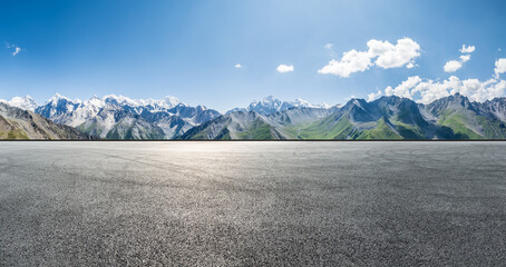 Wall Mural - asphalt road square and mountain natural landscape under blue sky. outdoor natural background.