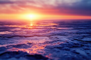 Poster - Frozen waves reflecting a vibrant sunset, creating a breathtaking winter landscape.