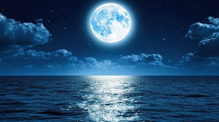 dark sky with a full moon casting light over calm ocean waves