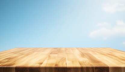 Wall Mural - empty wooden table against a bright blue sky.