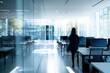 © Tahir - Bright business workplace with people in walking in blurred motion in modern office space