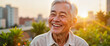 © Olga Nevskaya - Joyful elderly Asian man smiling in urban rooftop garden at sunrise, happiness
