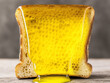 © Huo - Toast with Dripping Honeycomb and Golden Honey Flowing Down
