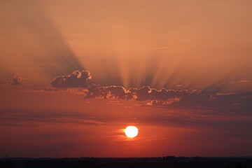 Wall Mural - Orange sunset and clouds