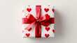 © Khatthaphone - White Gift Box Wrapped in Red Heart Paper Perfect for Valentine's Day