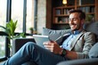 © velikiyzayats - Relaxed Man Using Tablet in Comfortable Living Room Perfect for Business, Technology, or Lifestyle Stock Photos