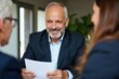 © velikiyzayats - Business Meeting with Smiling Executive Discussing Documents in Professional Office Setting, Ideal for Corporate Training Materials
