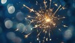© jayalath - Sparkling sparkler against blurred background with bokeh lights, creating festive atmosphere for New Year celebration or other events,copy space