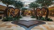 © chusnul - A decorative indoor space featuring heart-shaped trees and lush greenery.
