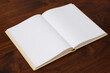 © KrishnaTedjo - A book with empty page on wooden table