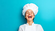 © NORN - Chef's Delight: A joyous female chef, her eyes closed in pure delight, throws her head back in laughter, her white chef's hat perched atop her head.