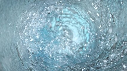 Wall Mural - super slow motion shot of water whirling in glass bottle at 1000fps.