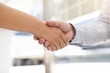 © chinnarach - close up investor businessman handshake with partner vendor,collaboration of two ceo leader hand shake for agreement or deal financial cooperative concept.