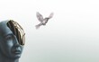 © Jorm Sangsorn - Freedom, escape, mindfulness concept artwork. surrealillustration. a bird flying out of a birdcage in human's mind.