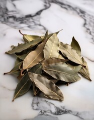 Sticker - Dried bay leaves on a marble surface.  Aromatic and flavorful.