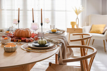 Poster - Stylish table setting with beautiful dishware and autumn decor in dining room