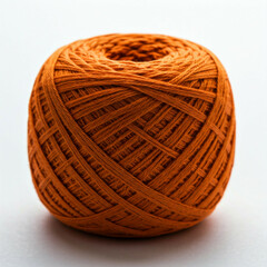 orange yarn ball on white background for crafting and knitting projects