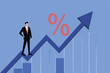 © arisadobe - A businessman standing on a rising blue arrow with a large percentage symbol above it.